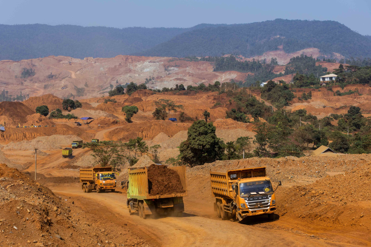 Dump trucks loaded with nickel ore headed to a jetty at a mining site in Molawe district on October 27, 2023 in North Konawe, Southeast Sulawesi, Indonesia.