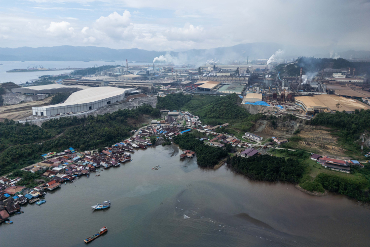 A view of the fishing village of Kurisa in Bahodopi district in the sea waters contaminated by nickel mines near Indonesia Morowali Industrial Park (IMIP) on June 13, 2024, in Morowali, Central Sulawesi, Indonesia.